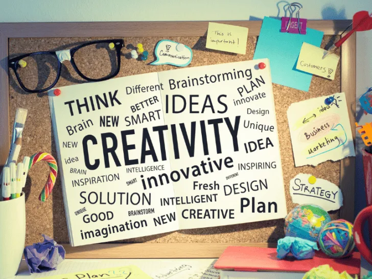 A bulletin board with the word creativity written on it.