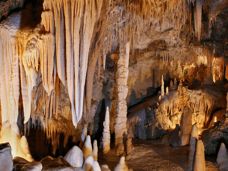 A group of caves with impressive stalactites.