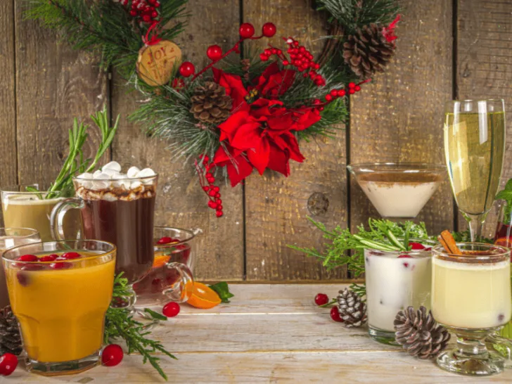 A wooden table with a Christmas wreath.